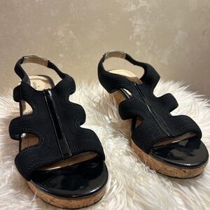 Adrienne Vittadini Black wedge Sandals with a 3" cork bottom. Size 10